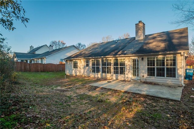 rear view of house featuring a patio area