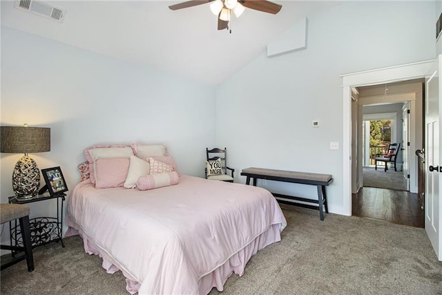 bedroom with wood-type flooring, lofted ceiling, and ceiling fan