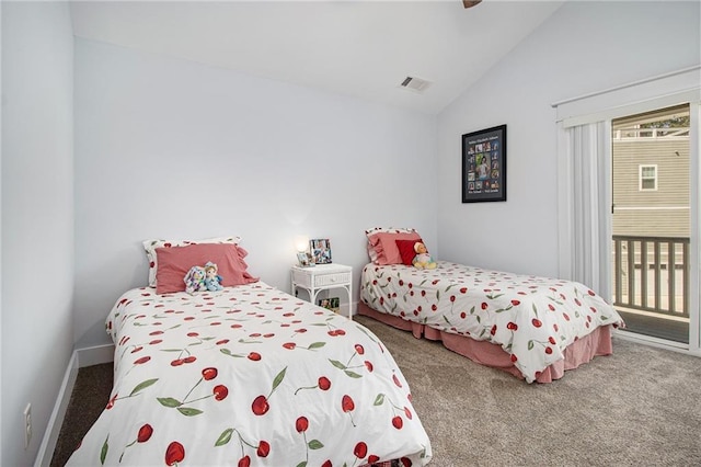 bedroom featuring vaulted ceiling and carpet floors