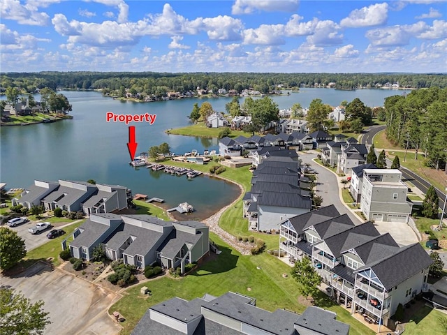 birds eye view of property featuring a water view