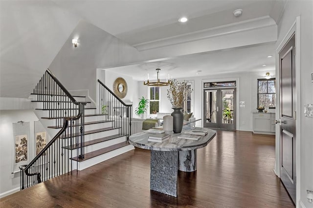 foyer with dark wood-type flooring