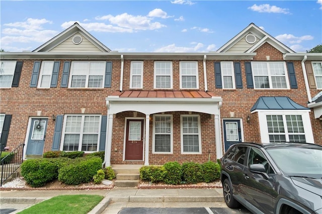 274 Paden Cove Trl, Lawrenceville, GA 30044 - multi unit property with a standing seam roof, uncovered parking, and brick siding