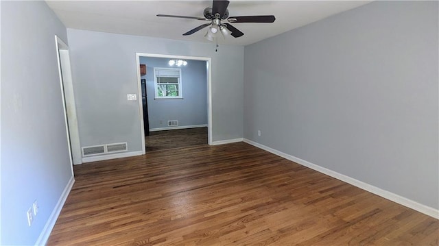 2569 Dobbs Dr NW, Kennesaw, GA 30152 - empty room featuring ceiling fan, wood finished floors, and baseboards