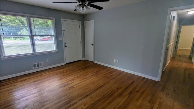 2569 Dobbs Dr NW, Kennesaw, GA 30152 - empty room featuring baseboards, ceiling fan, and wood finished floors