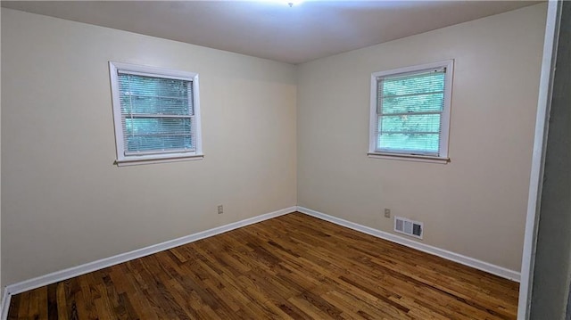 2569 Dobbs Dr NW, Kennesaw, GA 30152 - unfurnished room featuring baseboards and wood finished floors