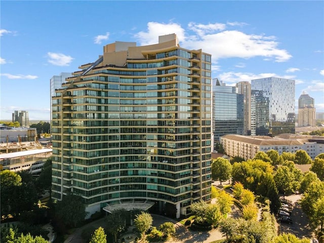 view of building exterior featuring a city view