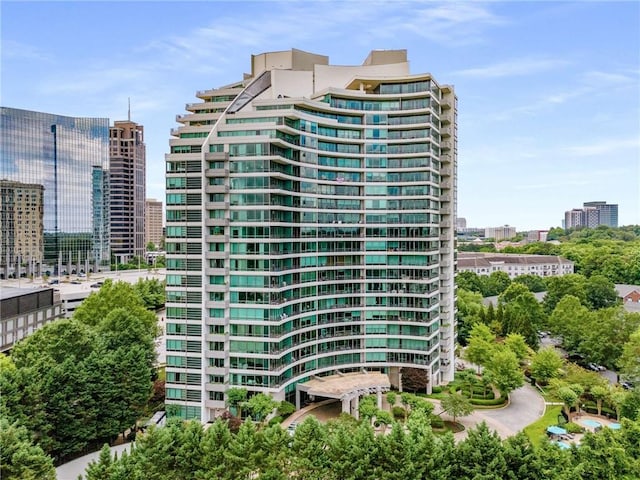 view of property with a city view