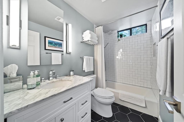 bathroom with tile patterned floors, visible vents, toilet, shower / tub combo with curtain, and vanity