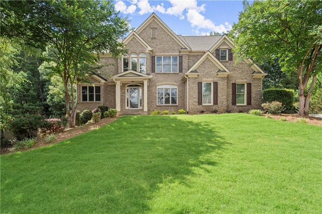 view of front facade with a front lawn