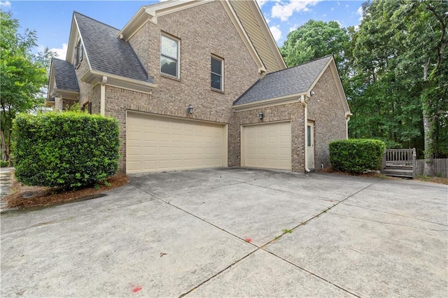 view of home's exterior featuring a garage