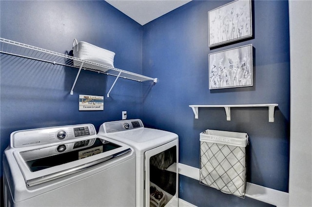 laundry room with laundry area and separate washer and dryer