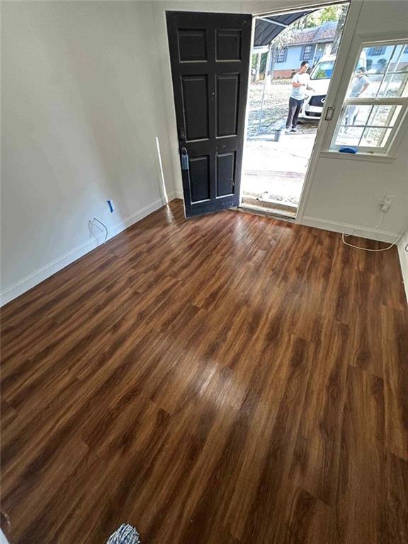 entryway featuring dark wood-type flooring