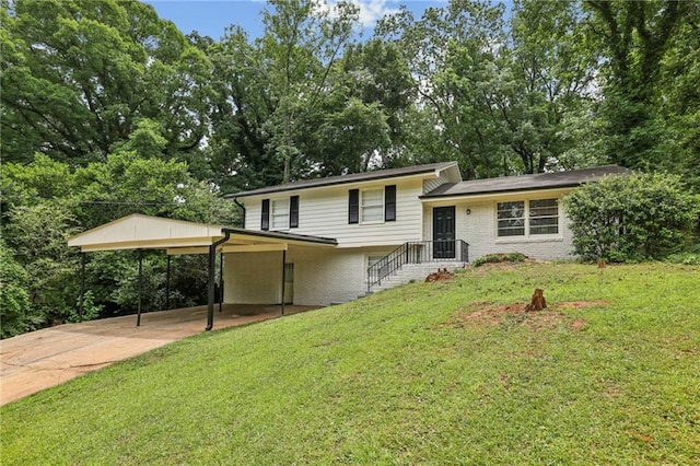 split level home featuring a front lawn