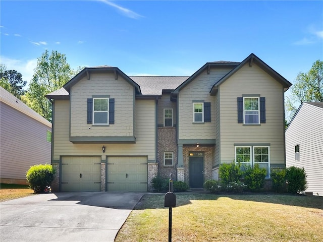 view of front of home with a front lawn, driveway, brick siding, and a garage