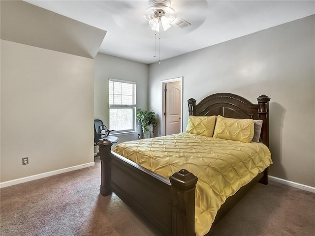 bedroom featuring baseboards, dark carpet, and ceiling fan