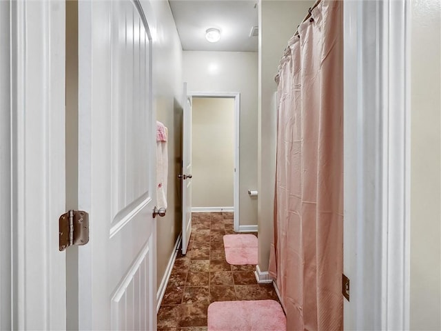 interior space with baseboards