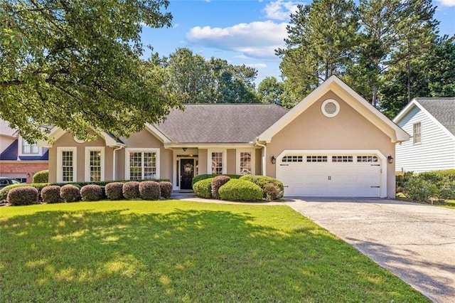 3072 Oaktree Ln, Duluth, GA 30096 - view of front of property with an attached garage, stucco siding, driveway, and a front lawn