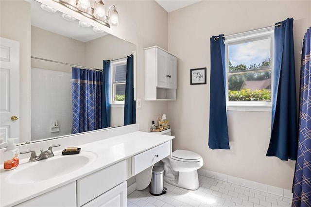 3072 Oaktree Ln, Duluth, GA 30096 - full bathroom featuring tile patterned flooring, vanity, and curtained shower