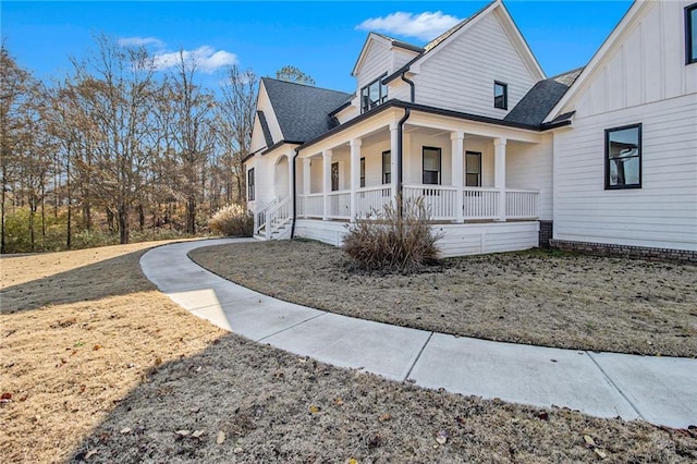 view of property exterior with a porch