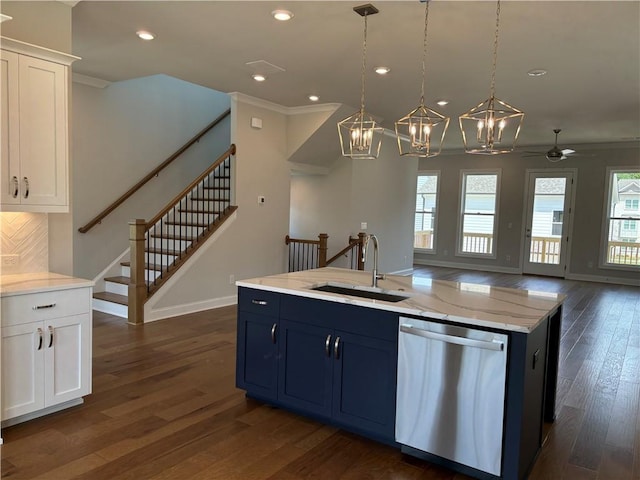 173 Basil St, Cumming, GA 30040 - kitchen with stainless steel dishwasher, a sink, white cabinetry, recessed lighting, and crown molding