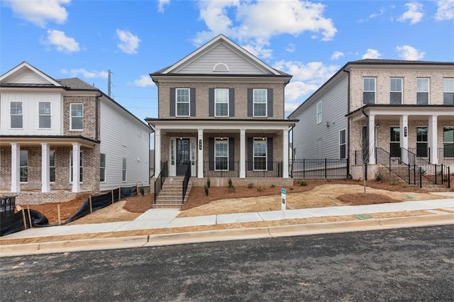 173 Basil St, Cumming, GA 30040 - view of front facade with a porch