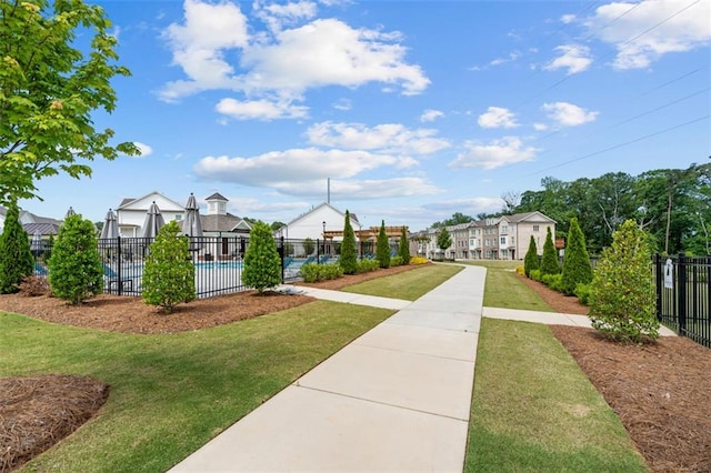 173 Basil St, Cumming, GA 30040 - view of community with a swimming pool and a residential view