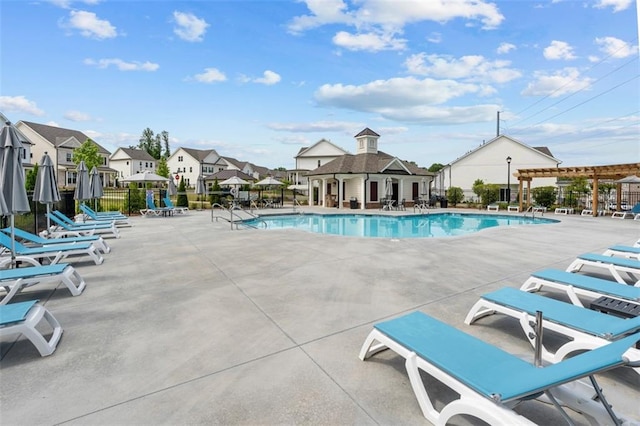 173 Basil St, Cumming, GA 30040 - community pool with a pergola, a residential view, and a patio