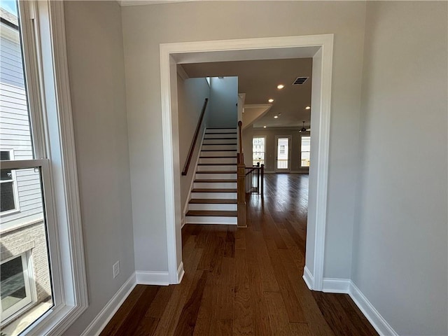 173 Basil St, Cumming, GA 30040 - staircase with wood finished floors, baseboards, ornamental molding, and recessed lighting