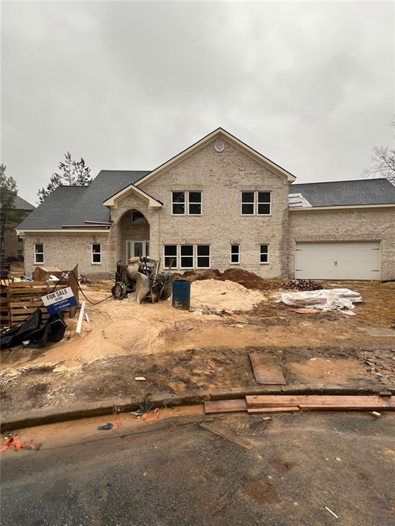 view of front of property featuring a garage