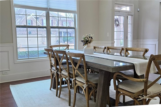 dining area with dark wood-type flooring