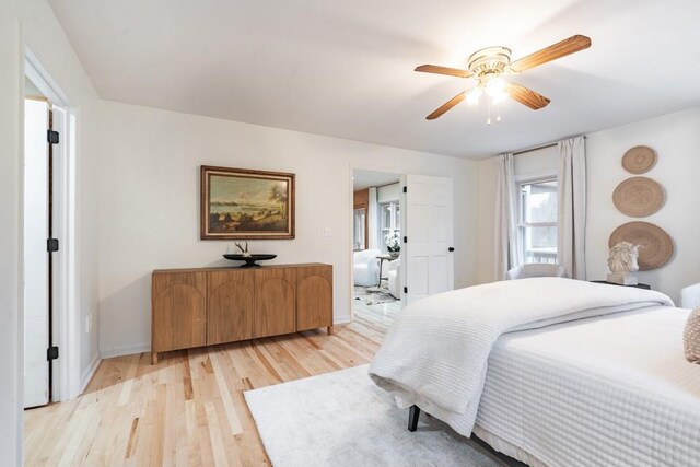 bedroom featuring ceiling fan and light wood-type flooring