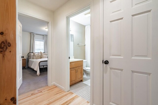 hall featuring light wood-type flooring