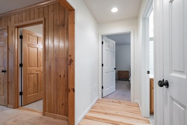 hall with light hardwood / wood-style flooring