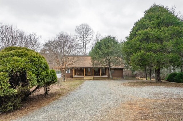 ranch-style home with covered porch