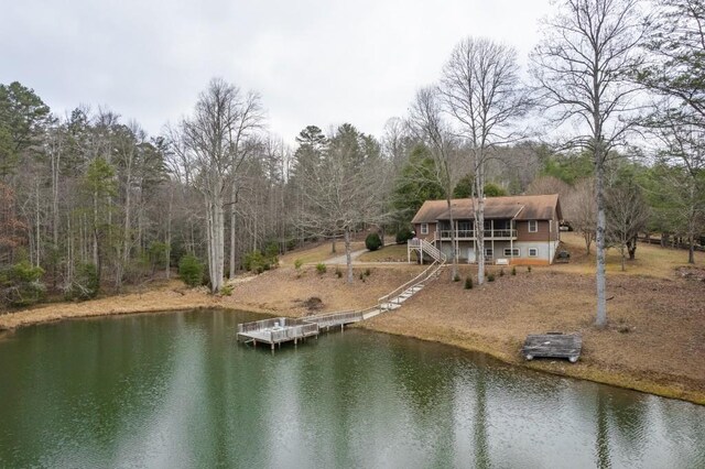 dock area with a deck with water view