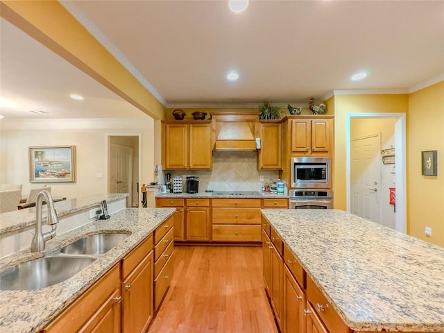 6416 Hickory Springs Cir, Hoschton, GA 30548 - kitchen with stainless steel appliances, custom range hood, a sink, light wood finished floors, and crown molding
