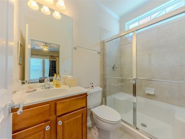 6416 Hickory Springs Cir, Hoschton, GA 30548 - full bathroom with a stall shower, toilet, ornamental molding, vanity, and ceiling fan