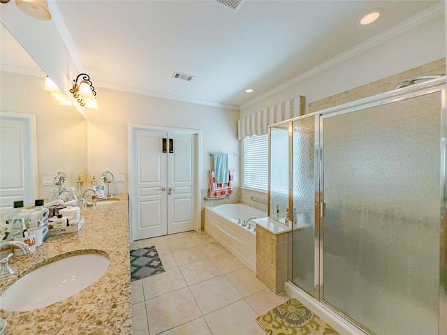 6416 Hickory Springs Cir, Hoschton, GA 30548 - bathroom with ornamental molding, a bath, a stall shower, tile patterned floors, and double vanity