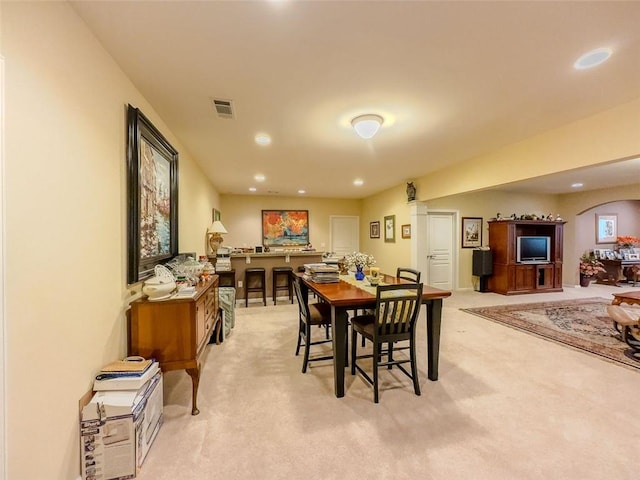 6416 Hickory Springs Cir, Hoschton, GA 30548 - dining area featuring light colored carpet, recessed lighting, and arched walkways