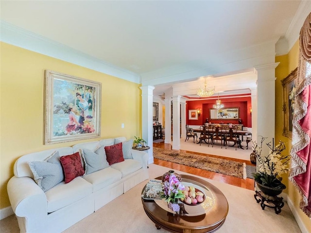 6416 Hickory Springs Cir, Hoschton, GA 30548 - living area featuring ornate columns, a chandelier, and ornamental molding