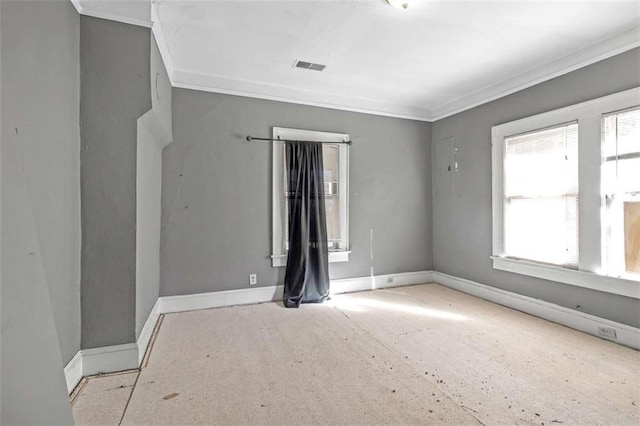 spare room with ornamental molding