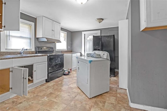 kitchen featuring white cabinets, black / electric stove, washer / dryer, and sink