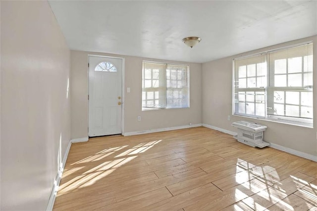 foyer entrance featuring light hardwood / wood-style flooring