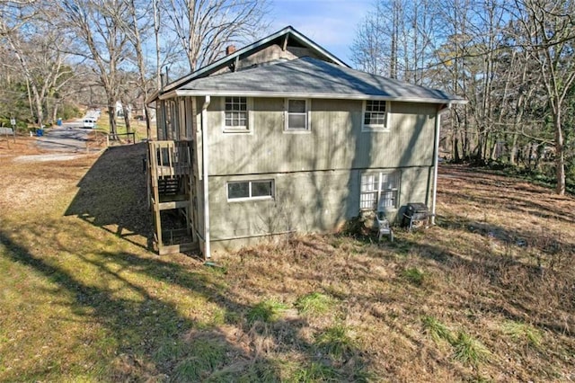 view of property exterior featuring a yard