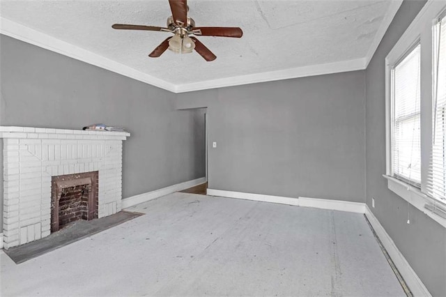 unfurnished living room with ceiling fan, a brick fireplace, and a textured ceiling