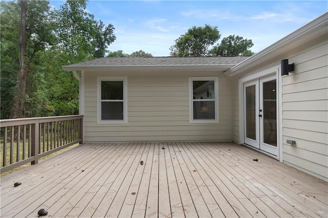 wooden deck featuring french doors