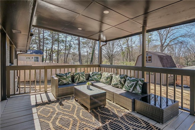 wooden deck featuring an outdoor hangout area