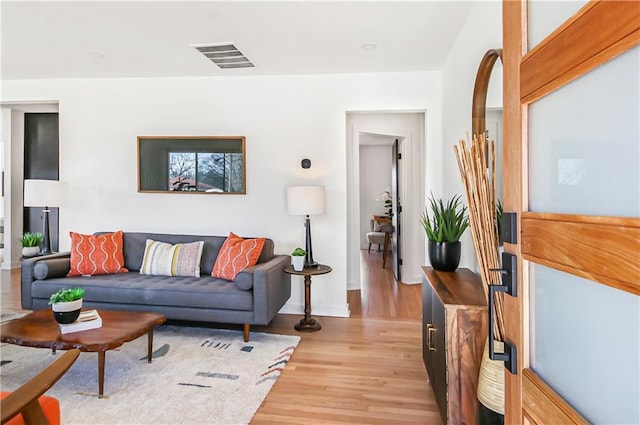 living room with light wood-type flooring