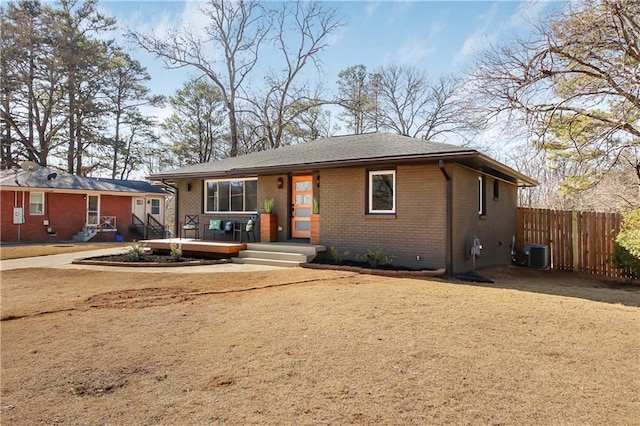 view of front of home featuring central AC unit