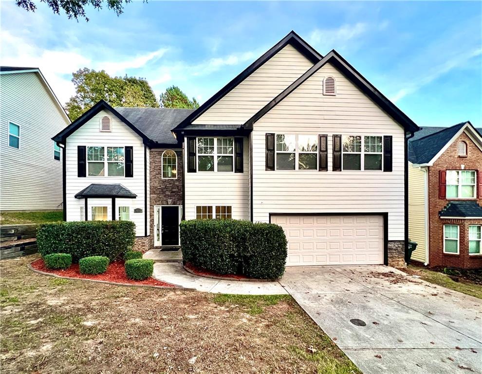 front facade with a garage